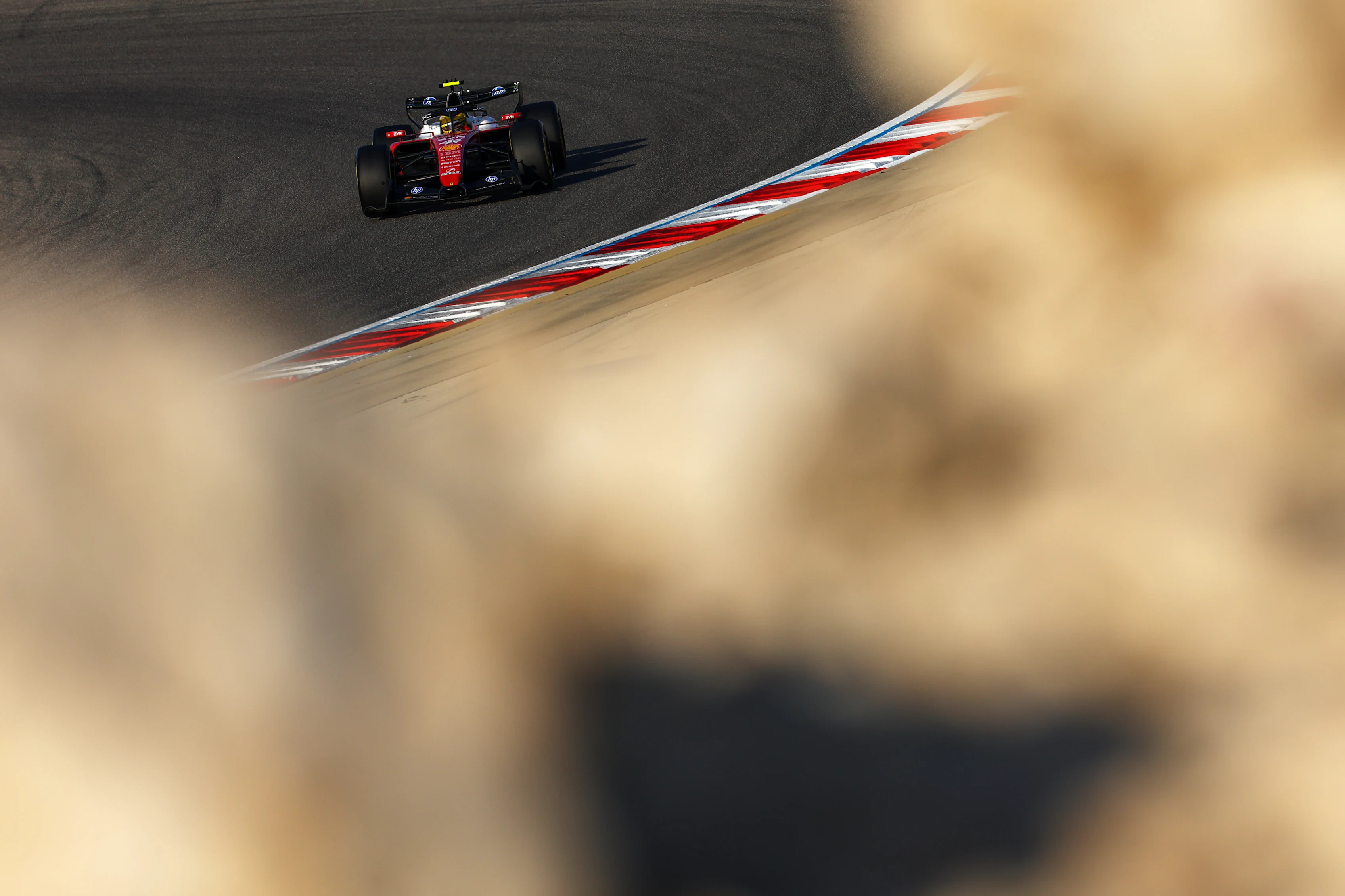 BAHRAIN, BAHRAIN - FEBRUARY 18: Lewis Hamilton of Great Britain driving the (44) Scuderia Ferrari