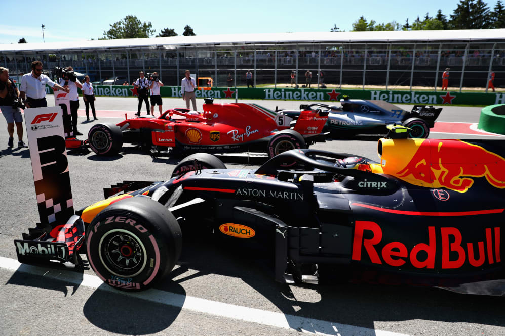 MONTREAL, QC - JUNE 09: Top three qualifiers Sebastian Vettel of Germany and Ferrari, Valtteri