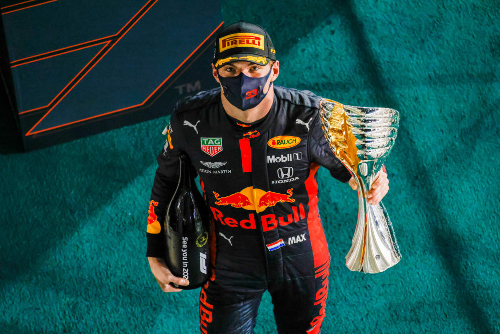 ABU DHABI, UNITED ARAB EMIRATES - DECEMBER 13: Race winner Max Verstappen of Netherlands and Red