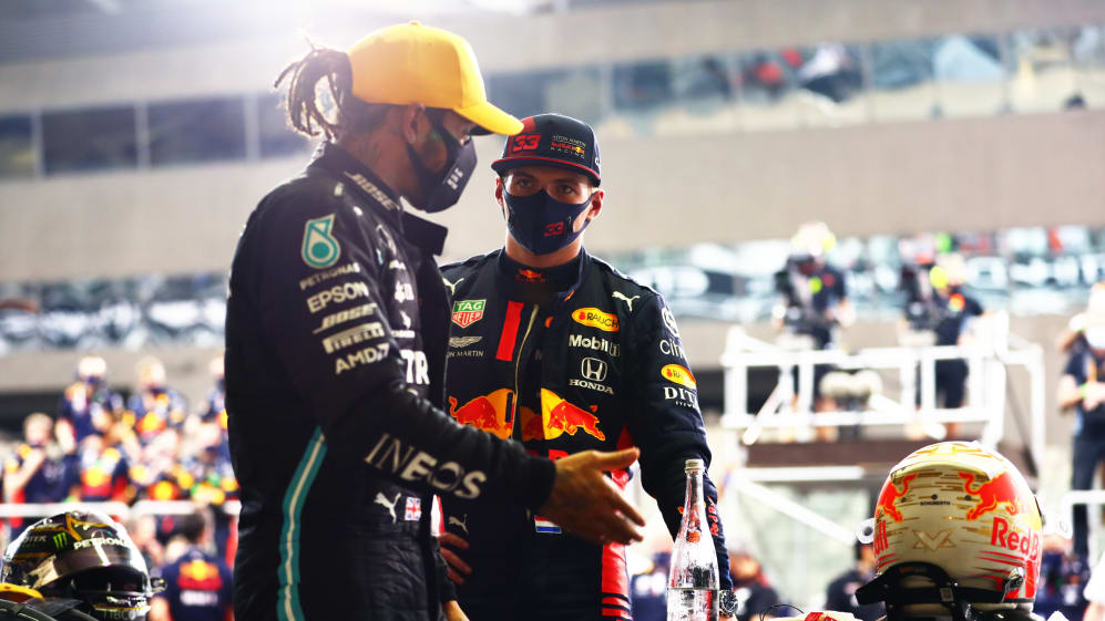 ABU DHABI, UNITED ARAB EMIRATES - DECEMBER 13: Race winner Max Verstappen of Netherlands and Red