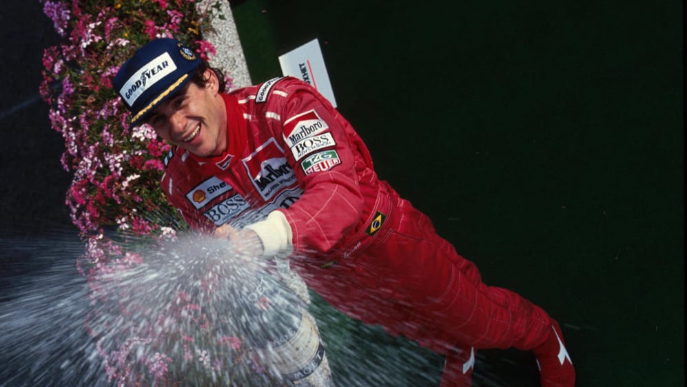 Race winner Ayrton Senna celebrates his victory on the podium.
Belgian Grand Prix, Spa, 25 August