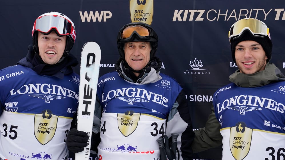 KITZBUEHEL, AUSTRIA - JANUARY 25: Danil Kvyat, Franz Toast and Pierre Gasly of Team Scuderia Toro