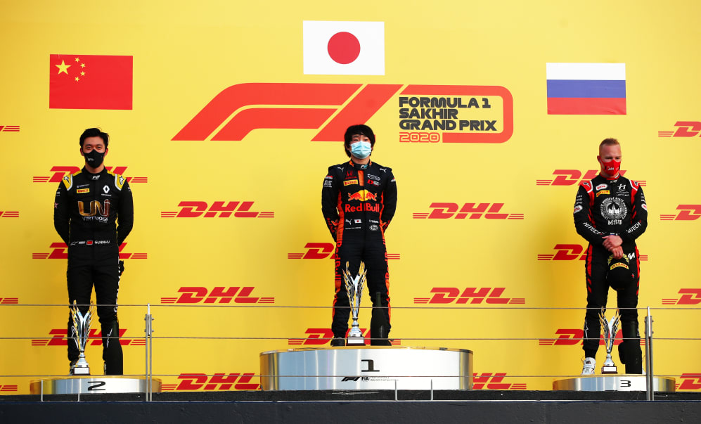 BAHRAIN, BAHRAIN - DECEMBER 05: Race winner Yuki Tsunoda of Japan and Carlin (centre), second