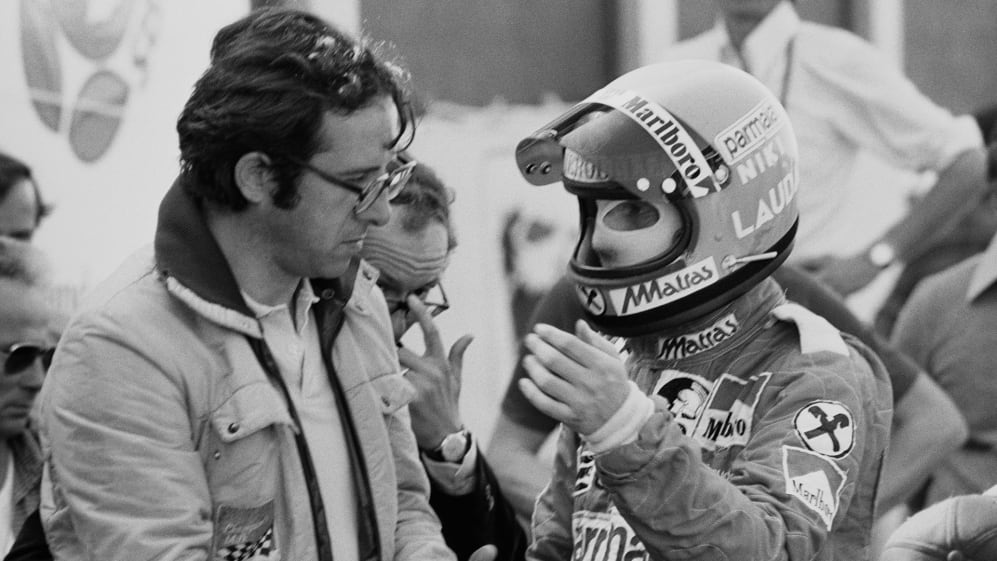 Austrian Formula One driver Niki Lauda discussing with Italian mechanical engineer of Ferrari Mauro