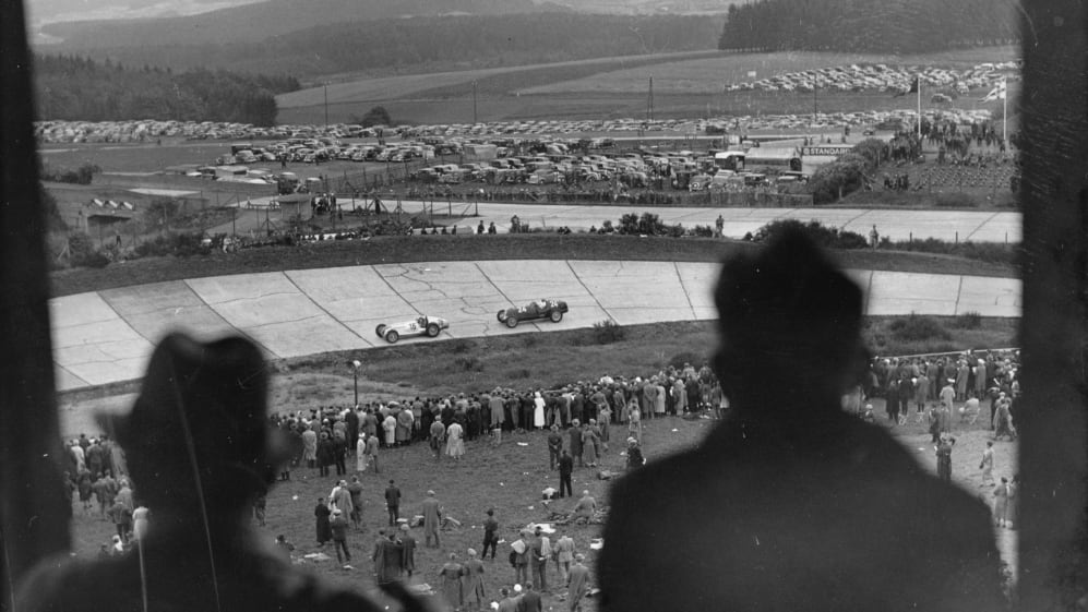 GERMANY - JULY 26: View from the grandstand over a racetrack, the parking lot and the spectators.