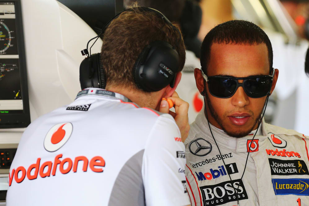 SUZUKA, JAPAN - OCTOBER 05: Lewis Hamilton of Great Britain and McLaren talks with his performance