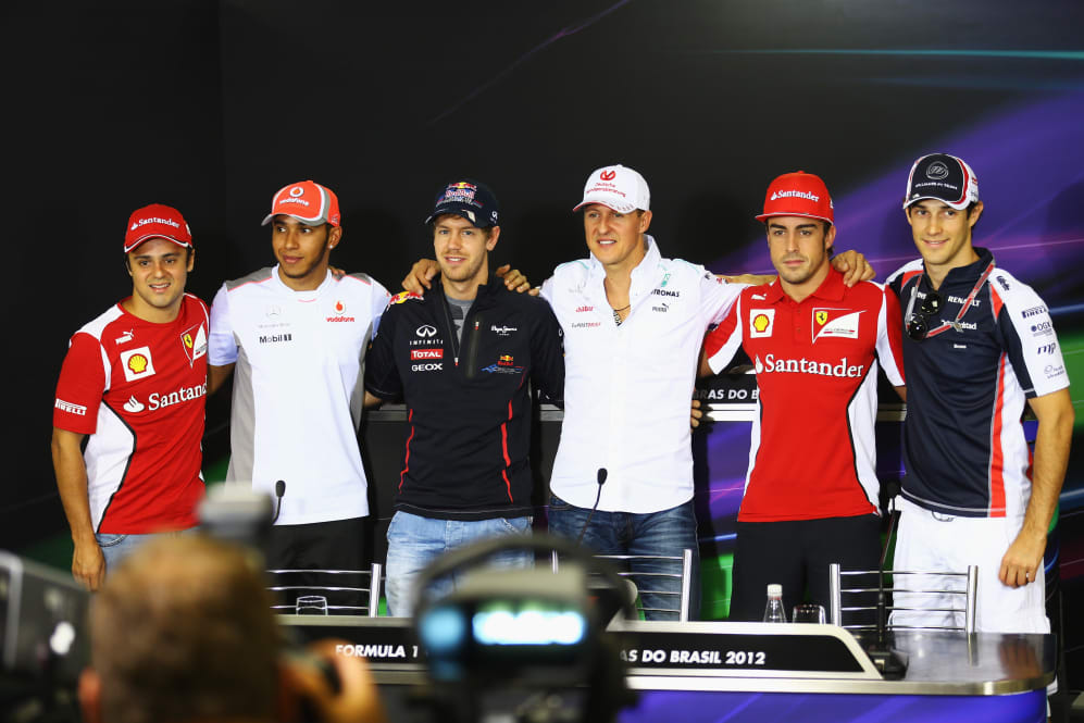 SAO PAULO, BRAZIL - NOVEMBER 22: (L-R) Felipe Massa of Brazil and Ferrari, Lewis Hamilton of Great