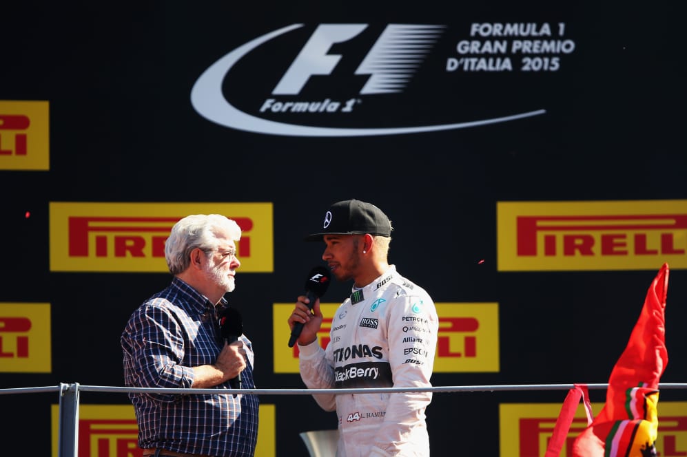 MONZA, ITALY - SEPTEMBER 06: Lewis Hamilton of Great Britain and Mercedes GP speaks with film
