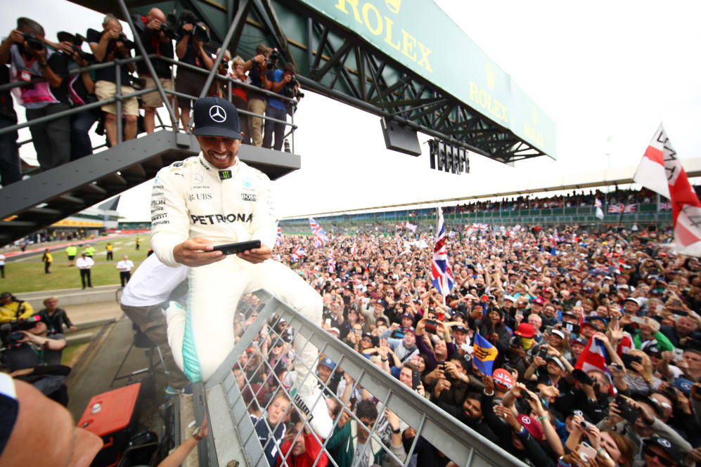 NORTHAMPTON, ENGLAND - JULY 16: Race winner Lewis Hamilton of Great Britain and Mercedes GP
