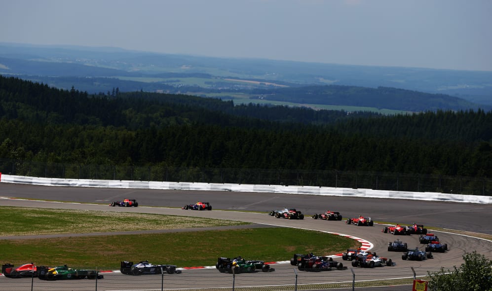 NUERBURG, GERMANY - JULY 07: Sebastian Vettel of Germany and Infiniti Red Bull Racing and Mark
