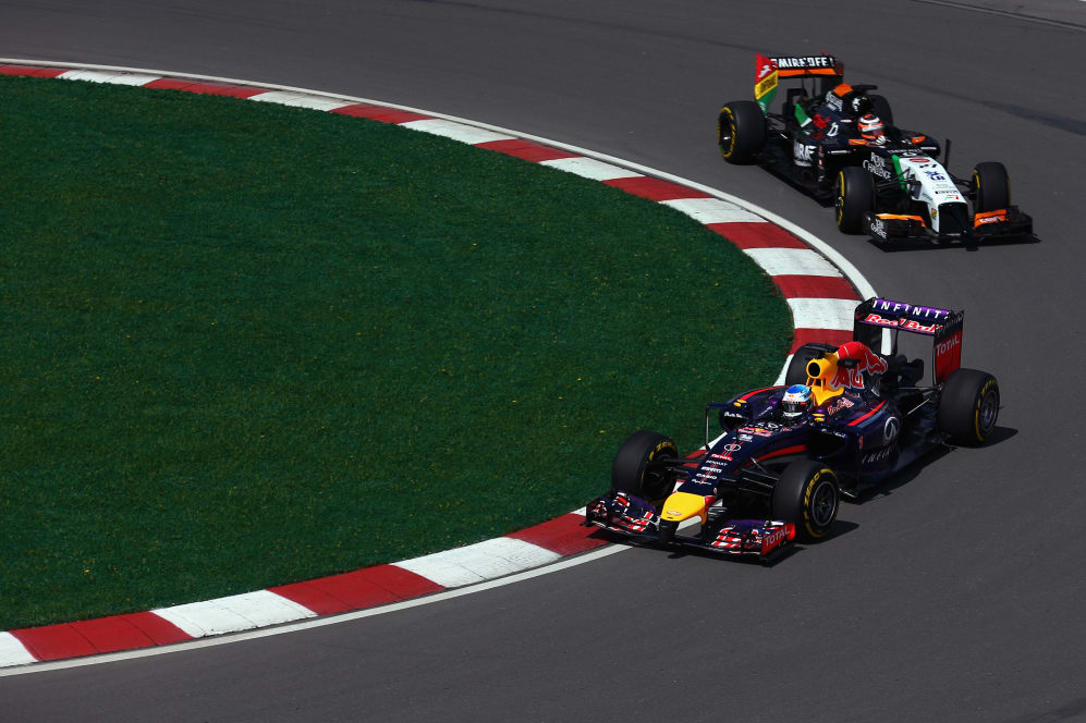 MONTREAL, QC - JUNE 06: Sebastian Vettel of Germany and Infiniti Red Bull Racing and Nico