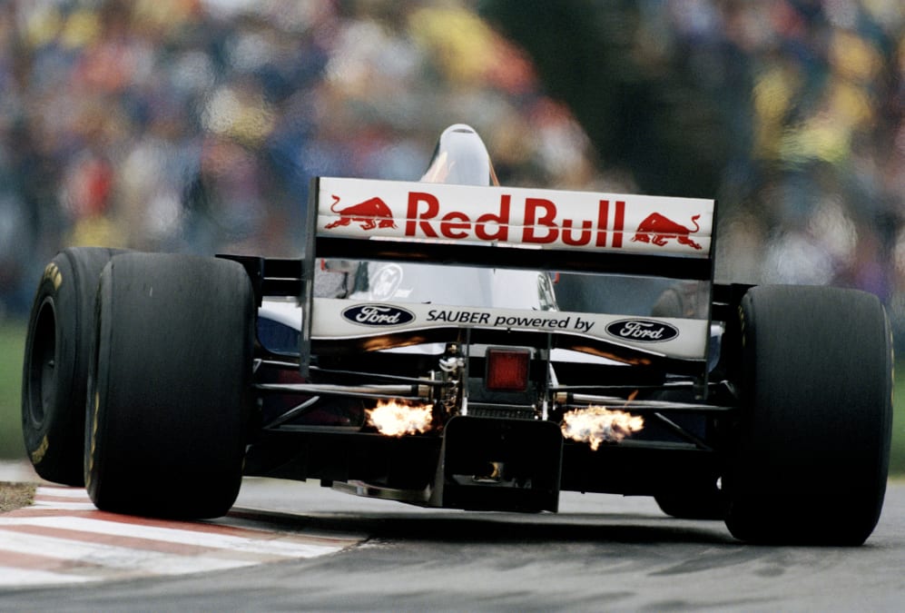 Flames flash from the exhausts of the #30 Red Bull Sauber Ford Sauber C14 Ford Zetec-R 3.0 V8