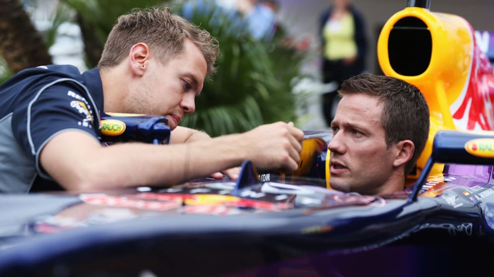 Sebastian Vettel (L) and Sebastien Ogier (R)