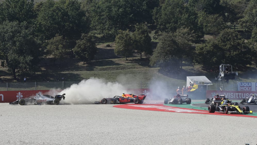 Haas driver Romain Grosjean of France, left, and Red Bull driver Max Verstappen of the Netherlands