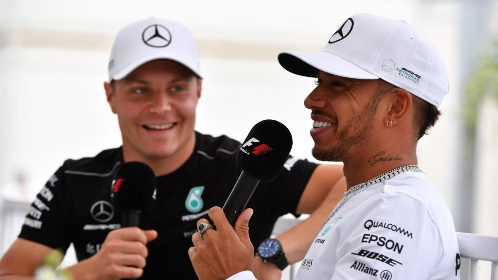 Valtteri Bottas (FIN) Mercedes AMG F1 and Lewis Hamilton (GBR) Mercedes AMG F1 at Formula One World
