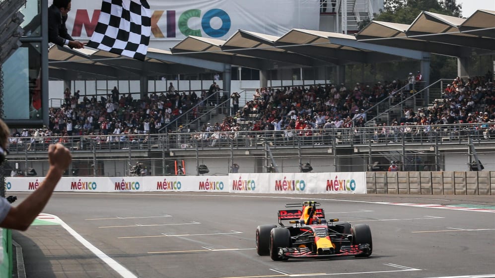 Race winner Max Verstappen (NED) Red Bull Racing RB13 takes the chequered flag at Formula One World