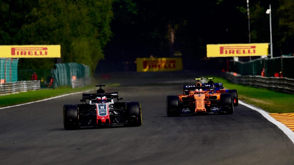 Romain Grosjean, Haas F1 Team VF-18 and Stoffel Vandoorne, McLaren MCL33 at Formula One World