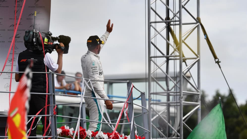 Race winner Lewis Hamilton, Mercedes AMG F1 celebrates on the podium at Formula One World