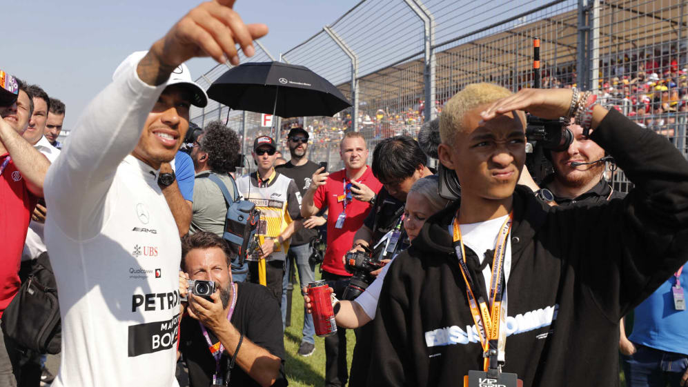 MELBOURNE GRAND PRIX CIRCUIT, AUSTRALIA - MARCH 17: Lewis Hamilton, Mercedes AMG F1, with Jaden