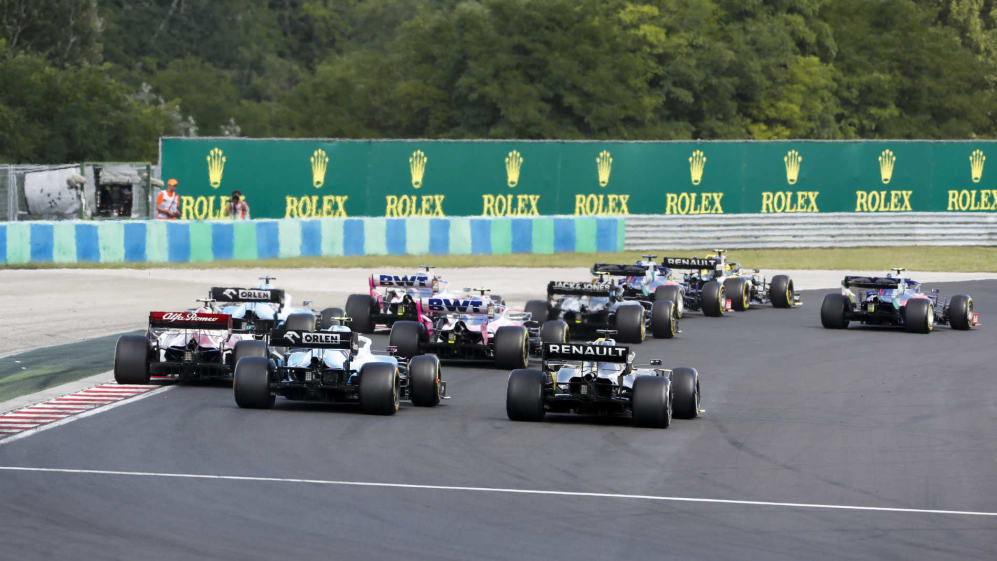 HUNGARORING, HUNGARY - AUGUST 04: Nico Hulkenberg, Renault R.S. 19, leads Alexander Albon, Toro