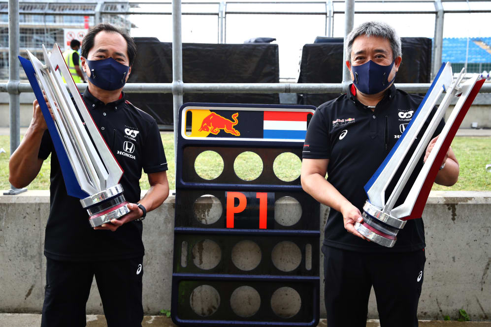 NORTHAMPTON, ENGLAND - AUGUST 09: Toyoharu Tanabe of Honda and Masashi Yamamoto of Honda celebrate