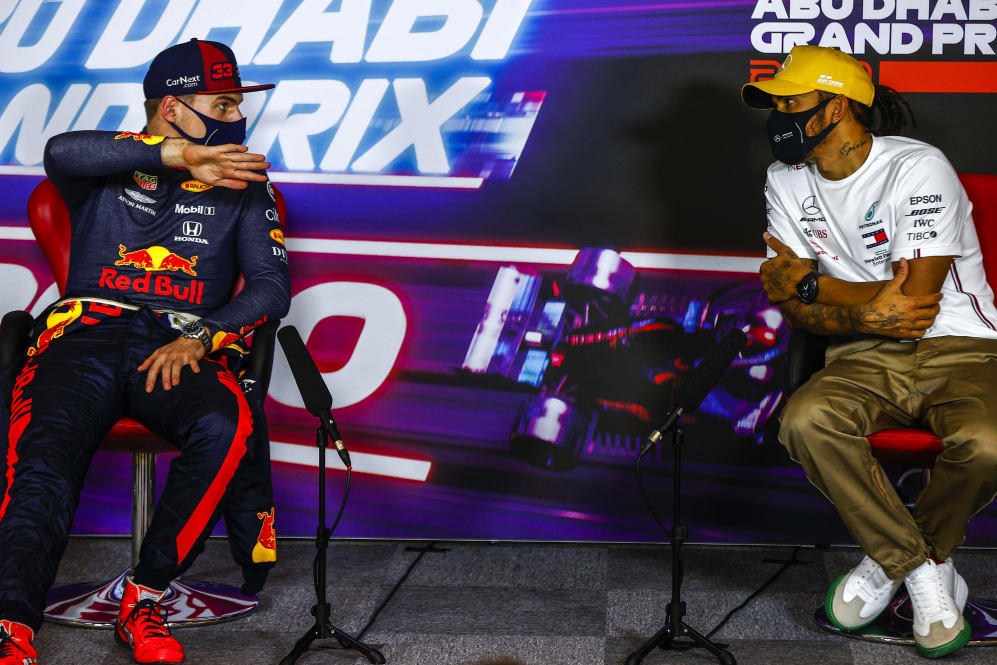 ABU DHABI, UNITED ARAB EMIRATES - DECEMBER 13: Race winner Max Verstappen of Netherlands and Red