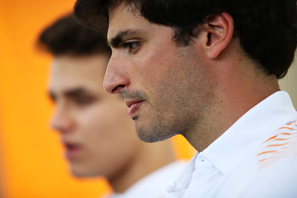 MELBOURNE, AUSTRALIA - MARCH 12: Carlos Sainz of Spain and McLaren F1 looks on in the Paddock