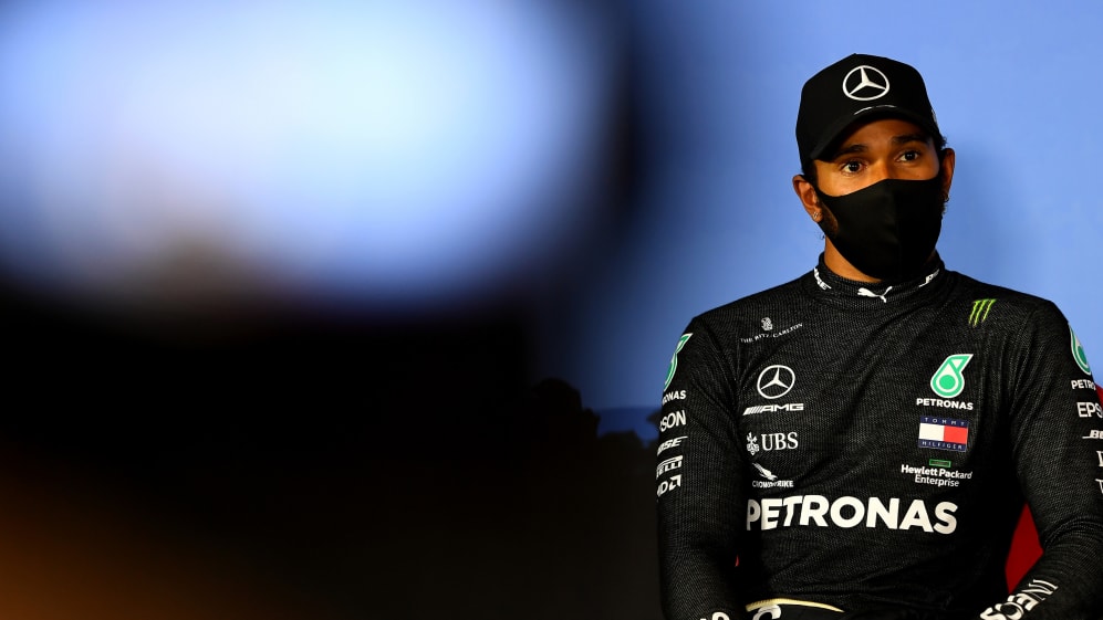 SPIELBERG, AUSTRIA - JULY 04: Lewis Hamilton of Great Britain and Mercedes GP talks to the media