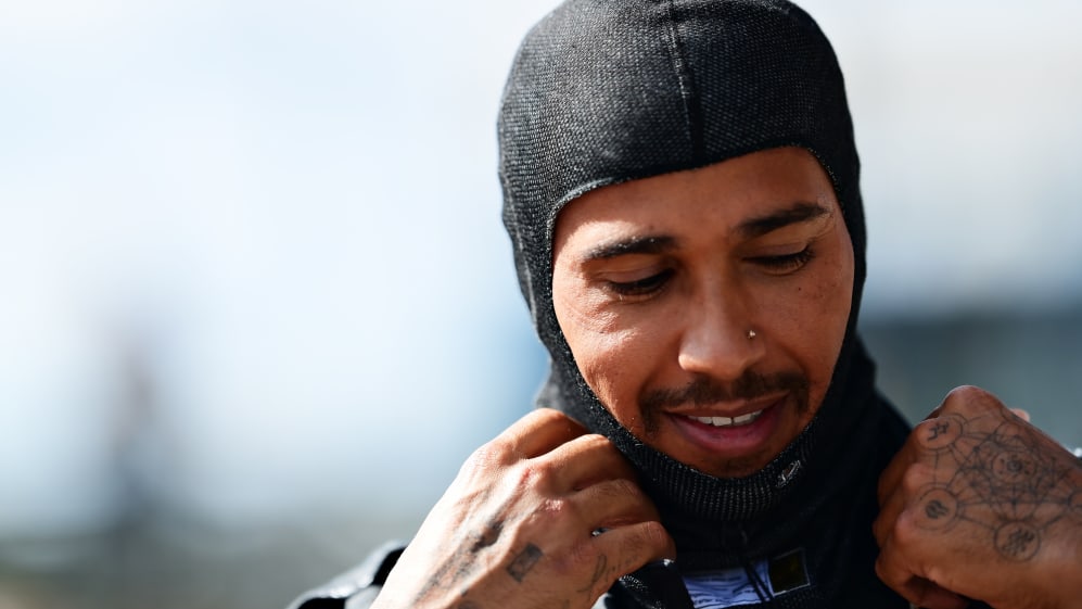 NORTHAMPTON, ENGLAND - AUGUST 02: Race winner Lewis Hamilton of Great Britain and Mercedes GP looks
