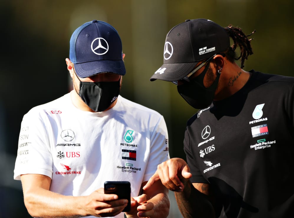 MONZA, ITALY - SEPTEMBER 03: Valtteri Bottas of Finland and Mercedes GP and Lewis Hamilton of Great