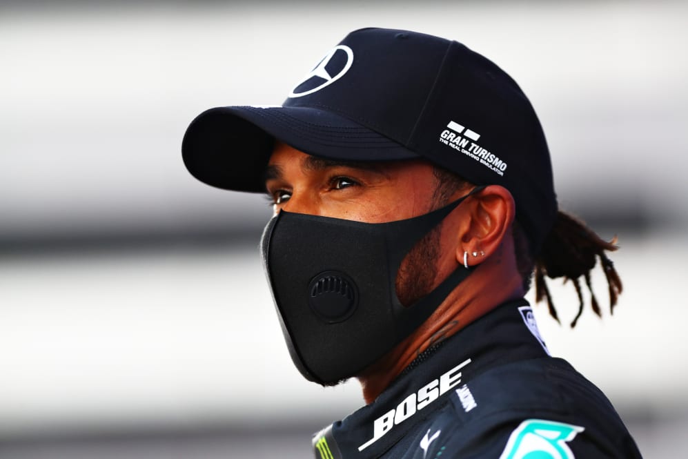 SOCHI, RUSSIA - SEPTEMBER 26: Pole position qualifier Lewis Hamilton of Great Britain and Mercedes