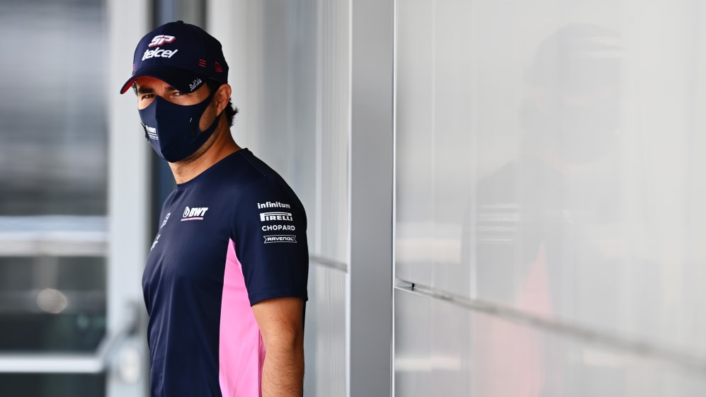 SOCHI, RUSSIA - SEPTEMBER 24: Sergio Perez of Mexico and Racing Point walks in the Paddock during