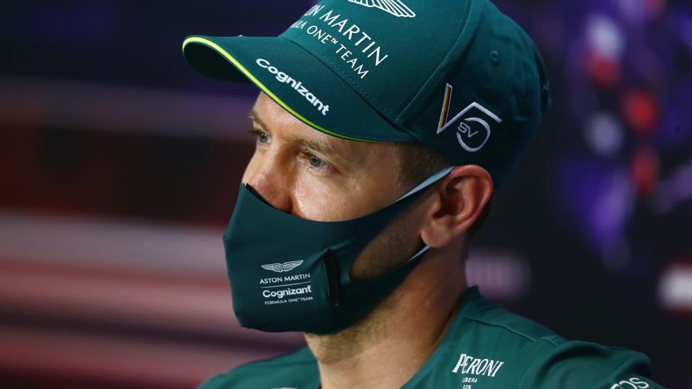 BAHRAIN, BAHRAIN - MARCH 25: Sebastian Vettel of Germany and Aston Martin F1 Team talks in the
