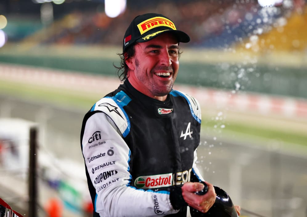 DOHA, QATAR - NOVEMBER 21: Third placed Fernando Alonso of Spain and Alpine F1 Team celebrates on