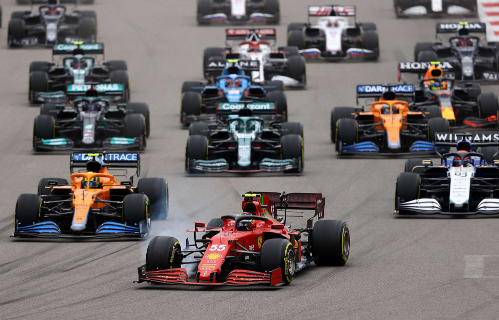SOCHI, RUSSIA - SEPTEMBER 26: Carlos Sainz of Spain driving the (55) Scuderia Ferrari SF21 leads
