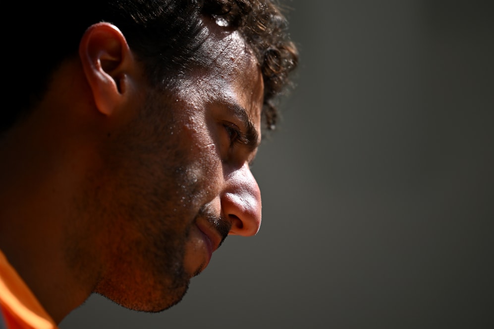 MIAMI, FLORIDA - MAY 06: Daniel Ricciardo of Australia and McLaren looks on in the Paddock prior to