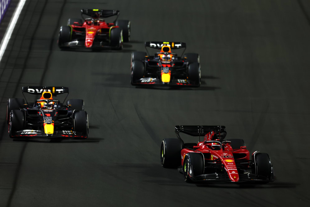 JEDDAH, SAUDI ARABIA - MARCH 27: Charles Leclerc of Monaco driving (16) the Ferrari F1-75 leads Max