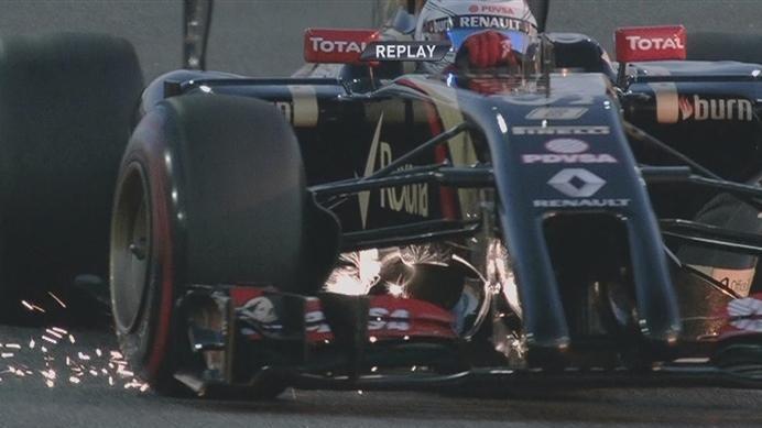 Sparks fly from the front wing of Romain Grosjean's Lotus. The Frenchman is eliminated in Q1. © FOWC Ltd. No reproduction without permission.