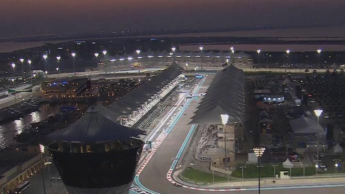 The Yas Marina circuit in all its floodlit glory, as Toro Rosso's Jean-Eric Vergne starts a flying lap © FOWC Ltd. No reproduction without permission.