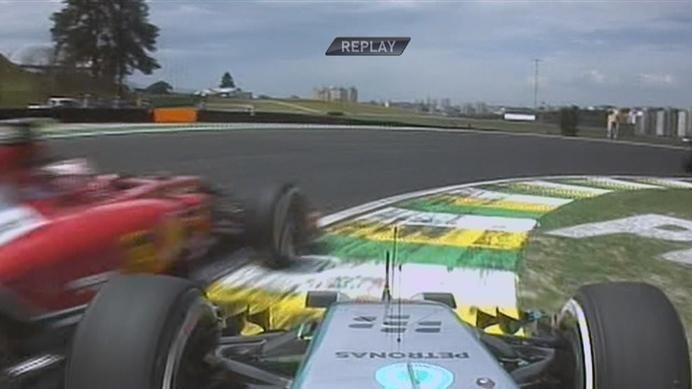 A near miss, as Mercedes' Lewis Hamilton tries to make way for the Ferrari of Kimi Raikkonen at Turn 8 © FOWC Ltd. No reproduction without permission.