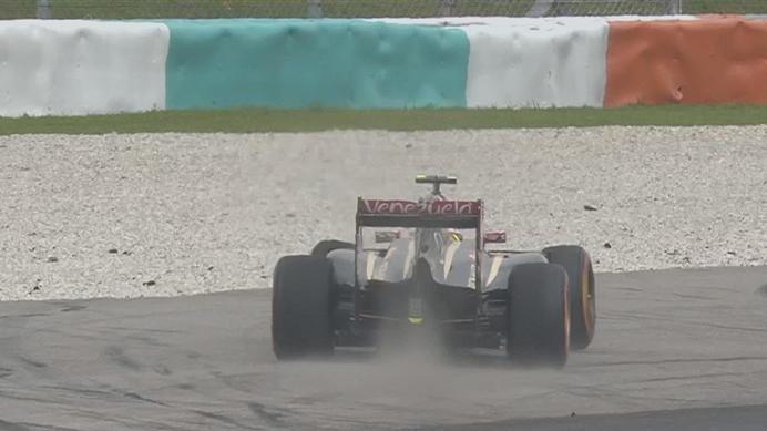Pastor Maldonado runs wide at Turn 8 in his Lotus as he puts in the laps following an overnight engine change. © FOWC Ltd