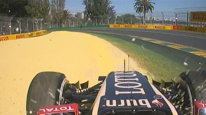 The struggling Lotus of Romain Grosjean finally takes to the track and shortly after makes a detour through the gravel © FOWC Ltd. No reproduction without permission.