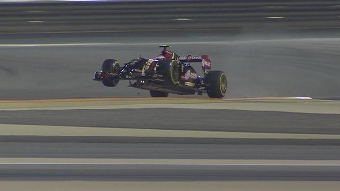  Pastor Maldonado runs wide at Turn 4 and launches over the kerb, sending shards flying off his Lotus. © FOWC Ltd