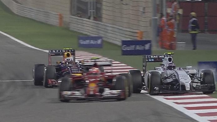 Williams' Valtteri Bottas passes Red Bull's Daniel Ricciardo but then has to take evasive action to avoid collecting the back of Kimi Raikkonen's Ferrari. © FOWC Ltd