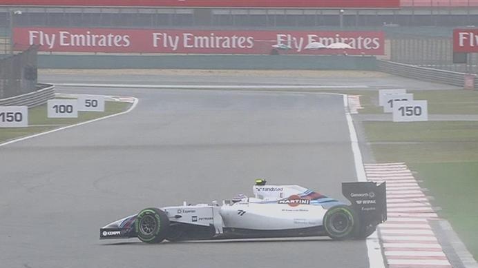 Williams' Valtteri Bottas spins exiting Turn 10 as the fine rain continues. © FOWC Ltd.