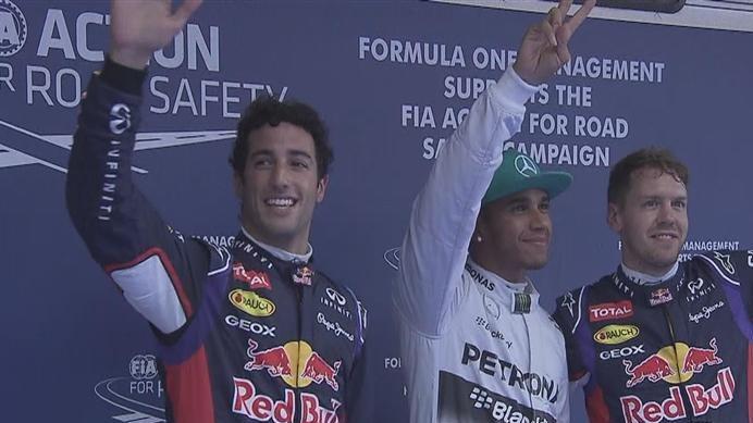 The top three drivers (L to R), Red Bull's Daniel Ricciardo, Mercedes pole man Lewis Hamilton and Red Bull's Sebastian Vettel acknowledge the fans after a thrilling qualifying session in Shanghai. © FOWC Ltd