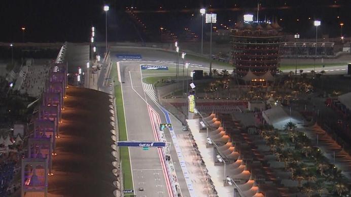  Kimi Raikkonen takes his Ferrari down the floodlit main straight to claim a short-lived tenancy of the top spot. © FOWC Ltd