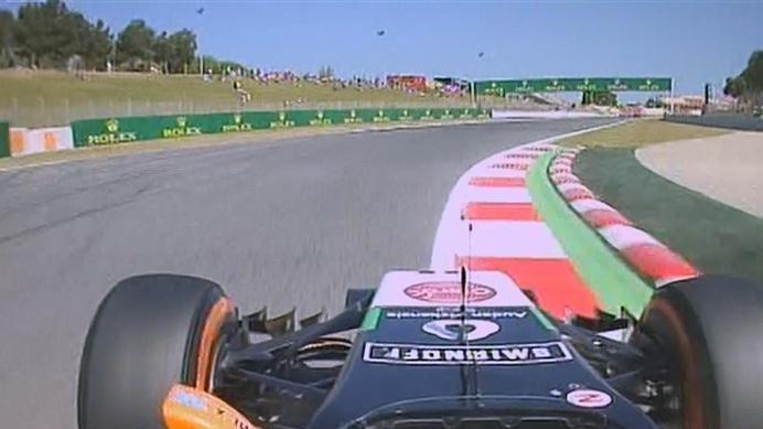 A bizarre early incident for Sergio Perez, as the wing mirror of his Force India falls off during the early part of free practice. © FOWC Ltd