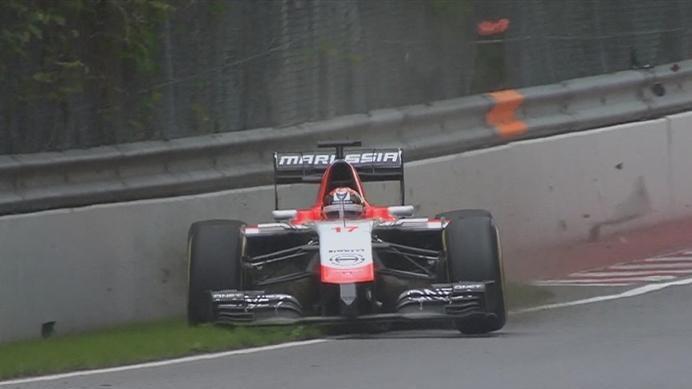 Jules Bianchi's Marussia is the first car to hit the wall in Canada in 2014. The Frenchman loses the rear exiting Turn 4, but is able to limp back to the pit lane. © FOWC Ltd