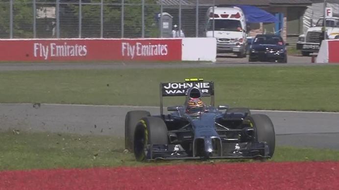 McLaren's Kevin Magnussen goes too deep and spins across the grass through Turns 1 and 2. © FOWC Ltd.